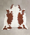 Brown and White X-Large Brazilian Cowhide Rug 6'9