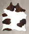 Chocolate and White Medium Brazilian Cowhide Rug 5'8