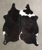 Black and White Medium Brazilian Cowhide Rug 4'9