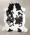 Chocolate and White XX-Large Brazilian Cowhide Rug 8'4