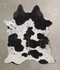 Black and White Large Brazilian Cowhide Rug 6'4