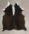 Chocolate and White Medium Brazilian Cowhide Rug 5'4