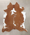 Brown and White XX-Large Brazilian Cowhide Rug 7'9